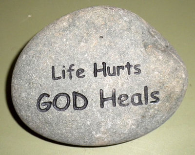 Life Hurts God Heals engraved rock