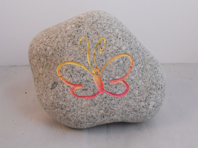 engraved butterfly rock