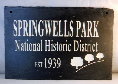 Engraved rock and slate National historic signs