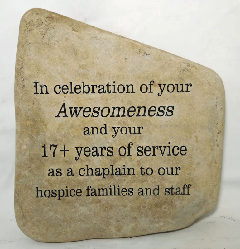 Engraved rock for recognition of service