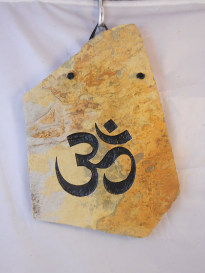 Om Silhouette engraved stone