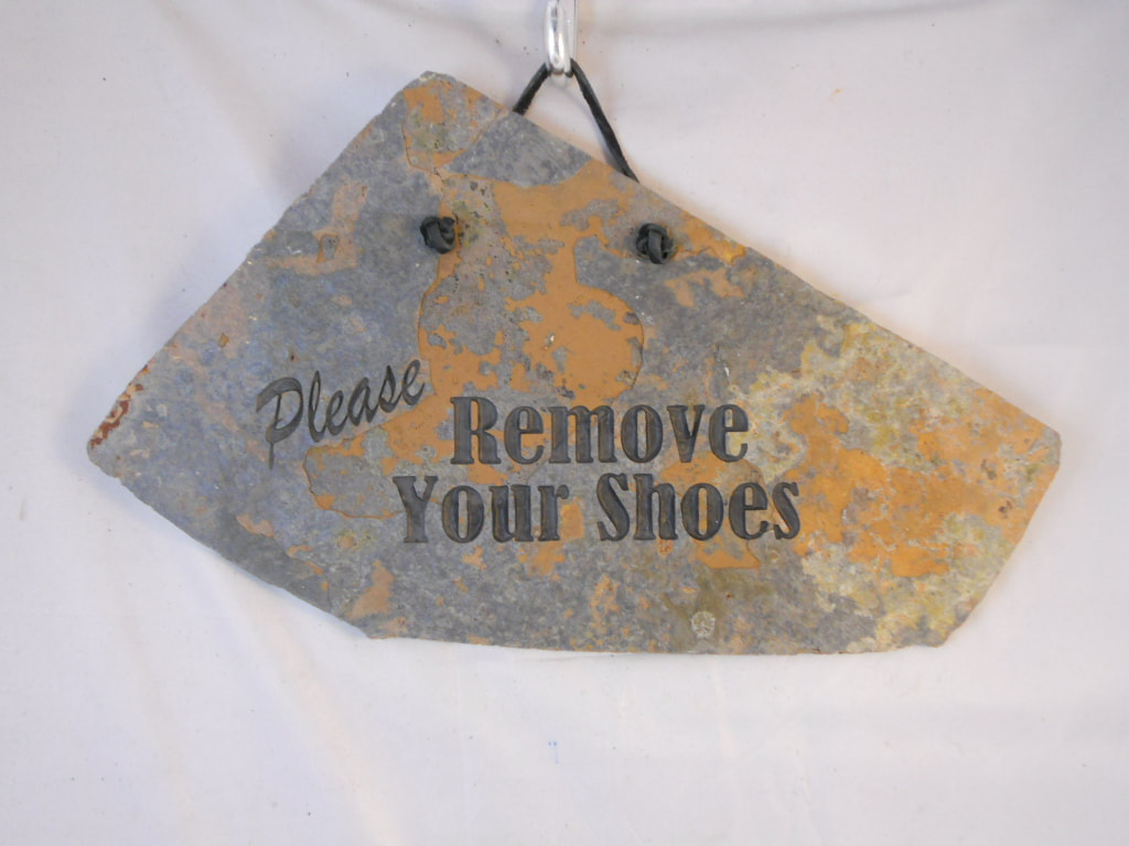 Please Remove Your Shoes
engraved stone sign