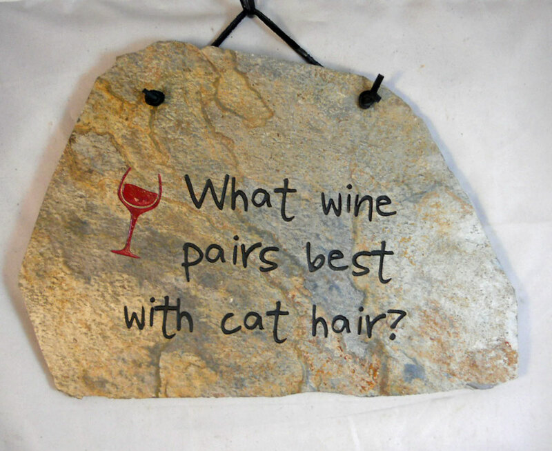 What wine pairs best with cat hair?
funny engraved stone sign