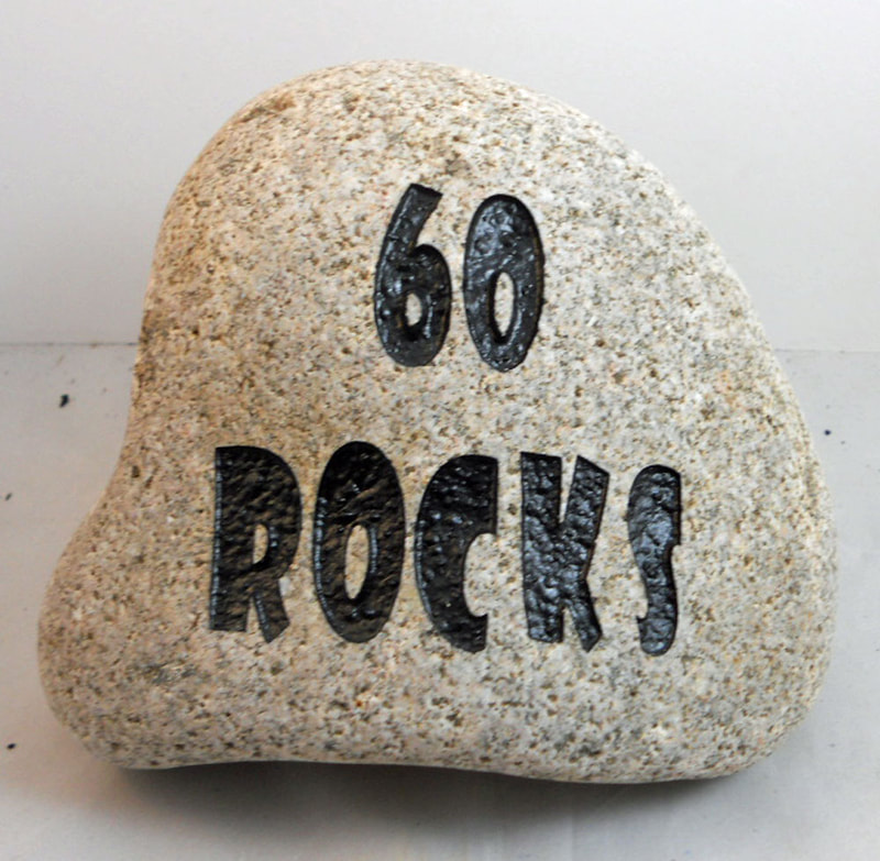 engraved birthday gift rock that says 60 rocks