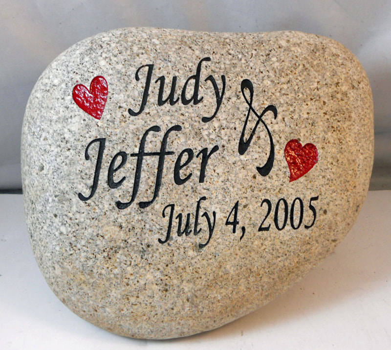 Stone Love Sign with Engraved Hearts