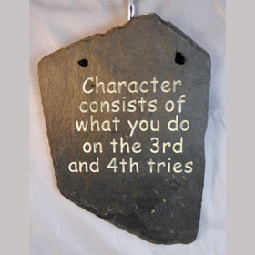 Character consists of what you do on the 3rd and 4th tries
engraved stone sign