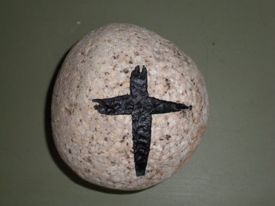 engraved faith rock with a cross