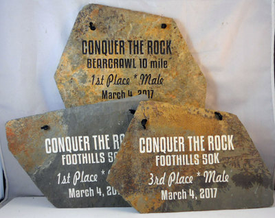 personalize custom rock and plaque trophies for sports and business