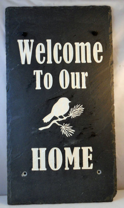 Engraved rock Home entry signs and plaques that say "Welcome to our home"
