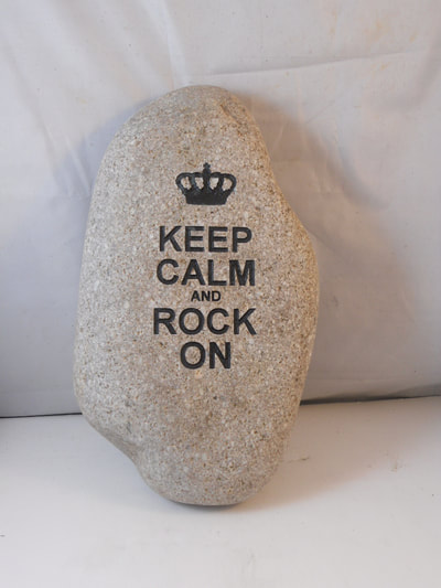 keep calm rock on stone signs