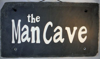 Engraved man cave rock and slate sign