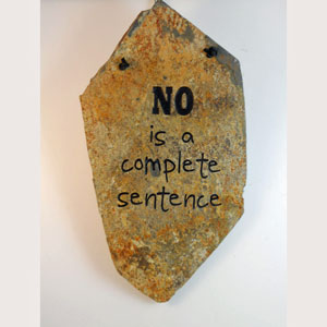 "No is a complete sentence" engraved stone sign