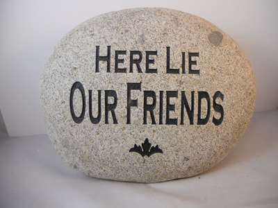 engraved pet gravestone "here lie our friends" per grave marker stone