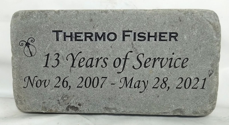Engraved Stone Sign for Recognition and Services