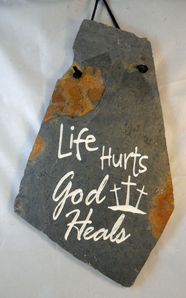 Life Hurts God Heals engraved stone sign