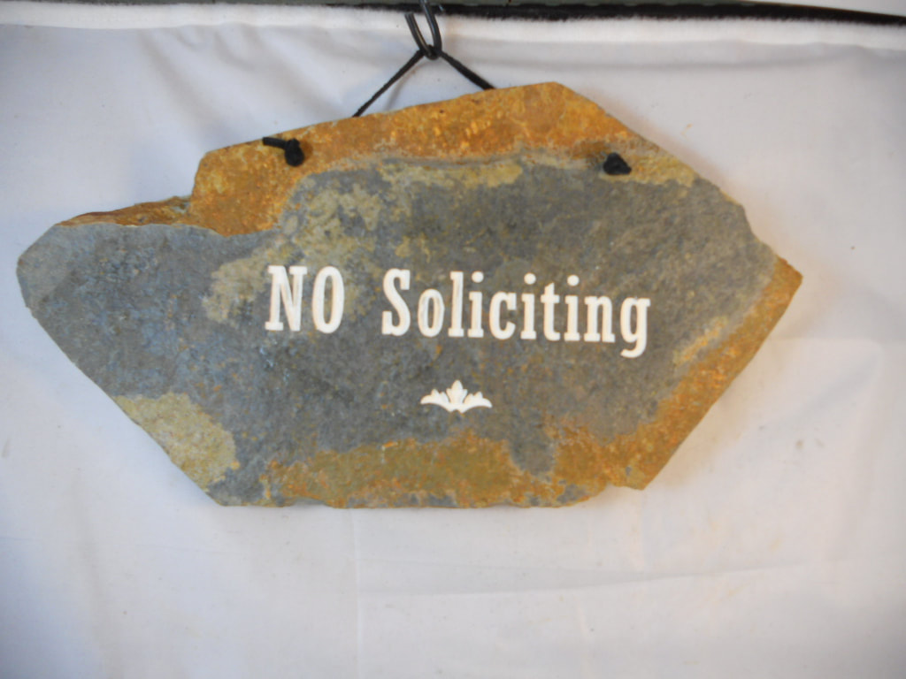 No Soliciting rock plaques and slate sign