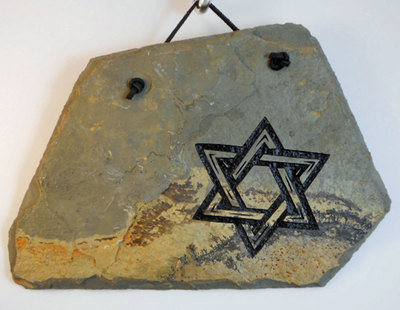 engraved stone plaque of the star of David