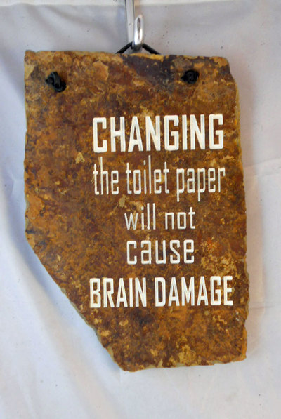 funny bathroom stone and plaque signs