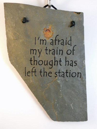 I'm afraid my train of thought has left the station
funny engraved stone sign