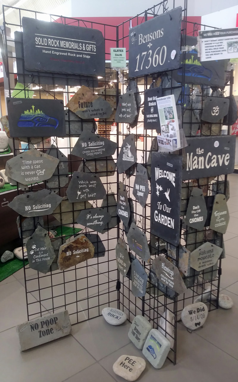 We sell engraved rock and slate gifts at all Seattle craft fairs