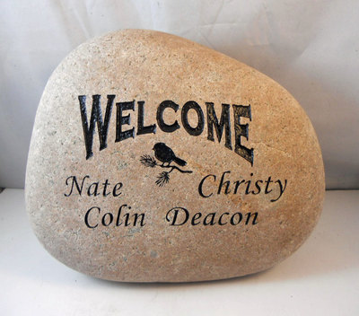 home welcome engraved rock sign